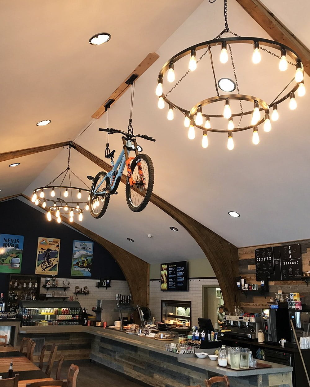 Rachel Atherton’s wining DH race bike suspended in the ceiling of the Pinemarten Cafe